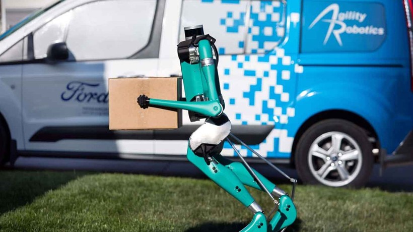 Robot Digit walking while carrying a box