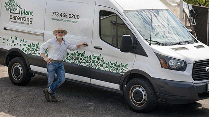 Image of man standing by Plant Parenting van