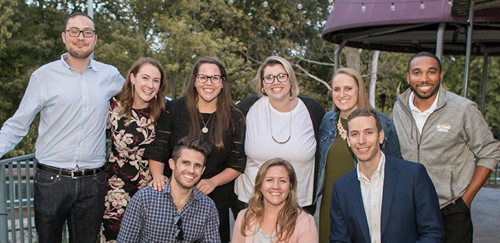 Group of well dressed coworkers in outside