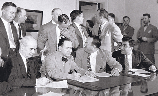 Black and white image of a group of men