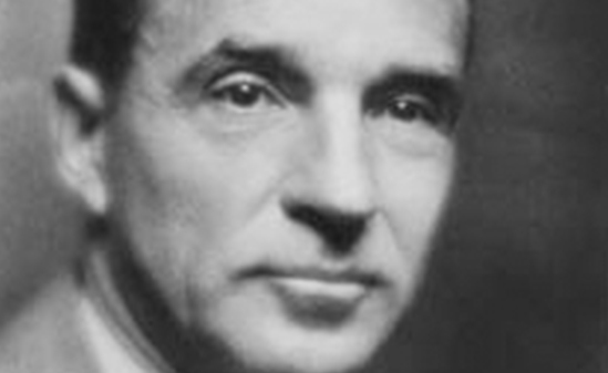 A close up black and white photo of Edsel Ford