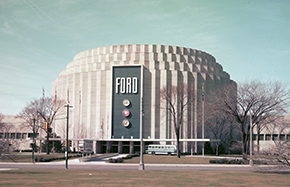 A white round building with the word Ford on it the Ford Rotunda