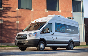 white smart city delivery van