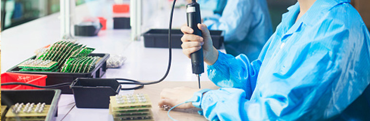 A worker soldering