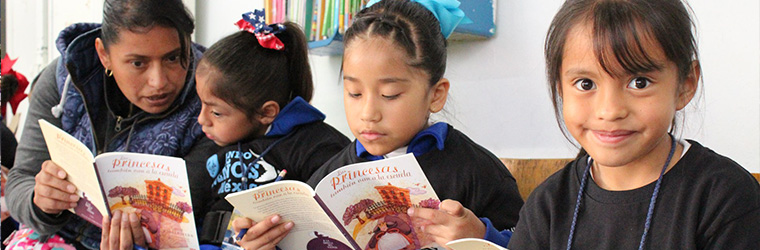 A group of children reading books