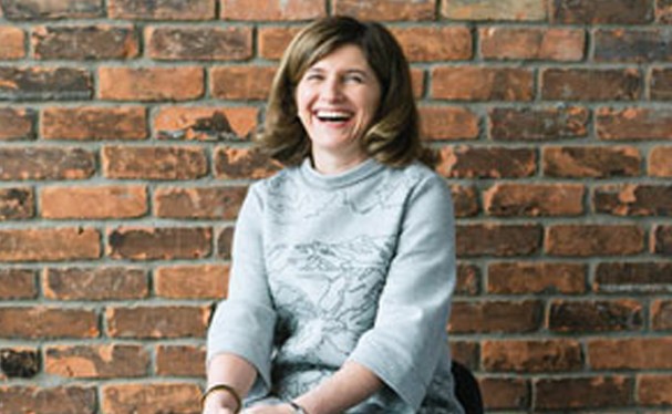 A photo of Karen Langona smiling at the camera