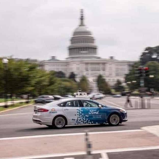 A self-driving vehicle driving on a road