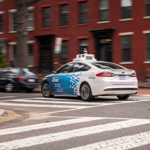 Self-driving vehicle driving on a road