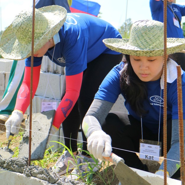 Two women helping out in the community