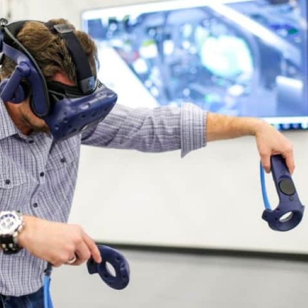 A man using an HTC Vive Pro