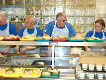 Ford Volunteer Corps Serves Meals, Delivers Food to Hungry Residents 