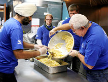 Ford Volunteer Corps Serves Meals, Delivers Food to Hungry Residents 