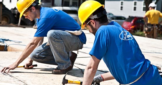 Volunteers work on a project for Habitat for Humanity Detroit.