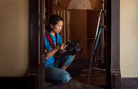 Photographer holding camera