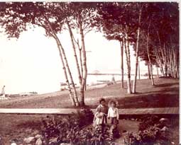 Image of: "The Birches and Bay," Mother and Child at Lake Cottages, Wequetonsing, Michigan