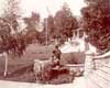 Image of: Man Drinking from Well at Lake Cottages, Wequetonsing, Michigan