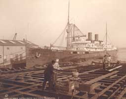 Image of: Boys Tossing Heated Rivets for Steamship Repair, Cramps Shipyards, Philadelphia, Pennsylvania