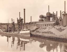 Image of: Steamship in Front of American Steel & Wire Company's Plant, Cleveland, Ohio