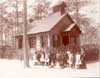 Image of: Teacher and her students at their one-room school at Pinehurst, Summerville, South Carolina