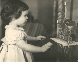 Toddler with Menorah