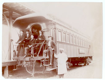 Image of DPC Photographers on back of railcar