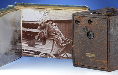 Image of  Salesman's book of California views and Cyclone 3 camera.