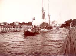 Image of: Tugboat Towing Lumber Schooner in the Canal, Charlevoix, Michigan