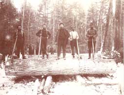 Image of: "The Loggers," on Felled Tree, Michigan